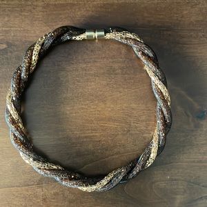 Brown and gold colored necklace